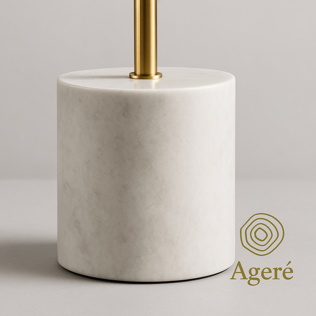 The Moon Lamp - Ageré Close - up of cylindrical white marble base with gold vertical stem