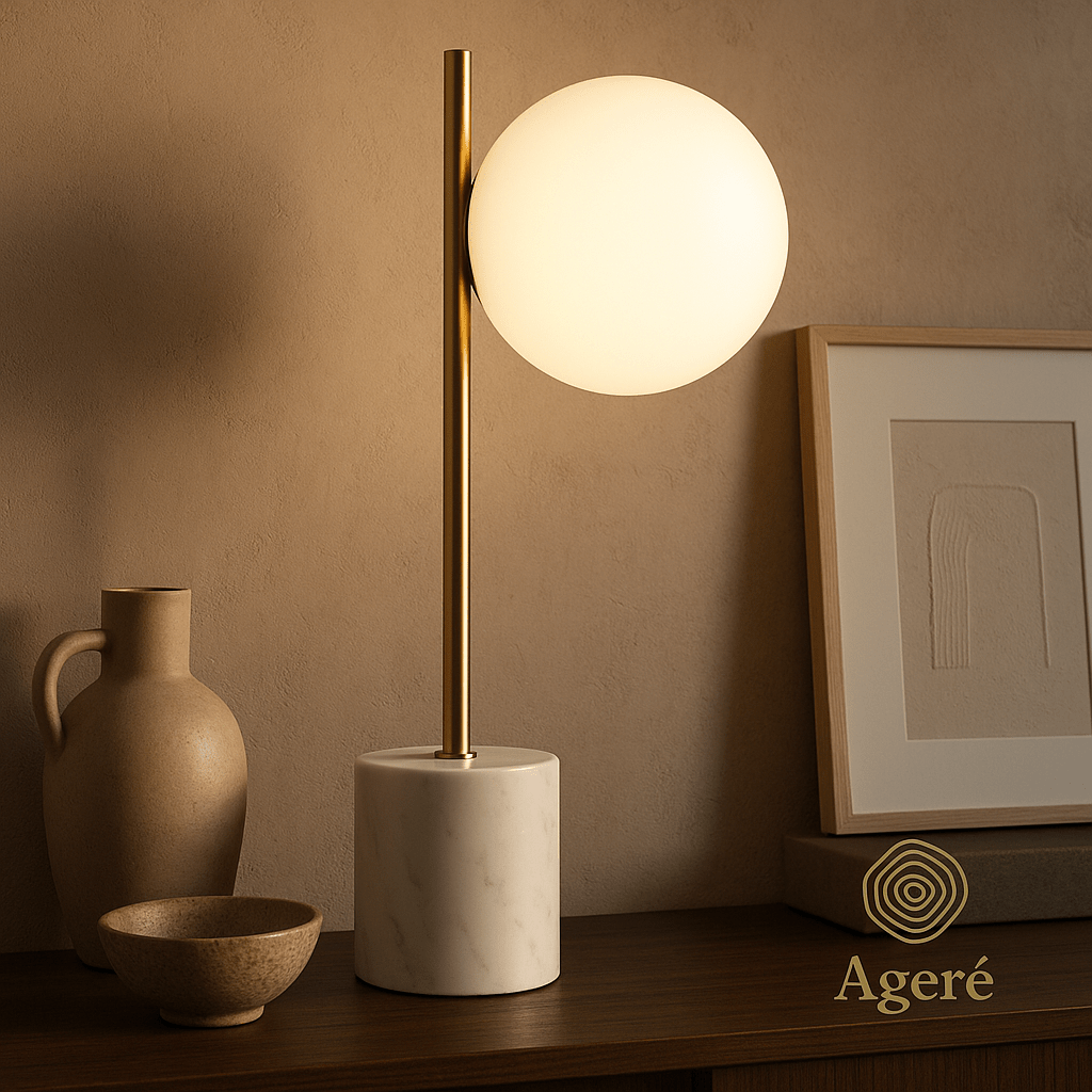 The Moon Lamp - Ageré Warm ambiance scene with The Moon Lamp glowing beside framed artwork