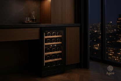 The Refined Compact by Ageré – undercounter wine fridge in luxury apartment with city skyline