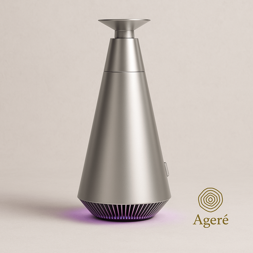 The Silent Bloom - AgeréThe Silent Bloom diffuser — brushed silver finish, conical silhouette, minimalist backdrop