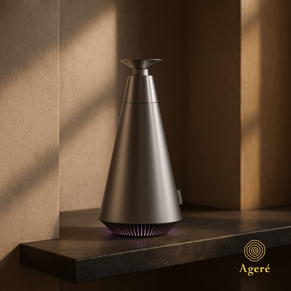 The Silent Bloom - AgeréThe Silent Bloom aroma diffuser placed on a shelf — architectural lighting and shadow